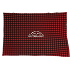 Red and black checkered blanket with a logo on a white background