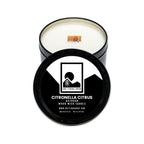 Candle with black lid featuring Sol Terra Shop logo and product details with citronella & citrus scent