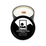 Candle with black lid featuring Sol Terra Shop logo and product details with citronella & citrus scent