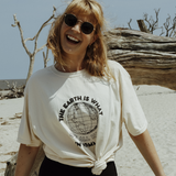 Girl wearing organic cotton t-shirt at the beach