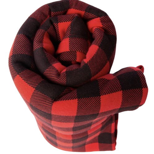 Red and black plaid organic cotton blanket rolled up