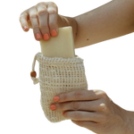 woman putting soap in a soap saver