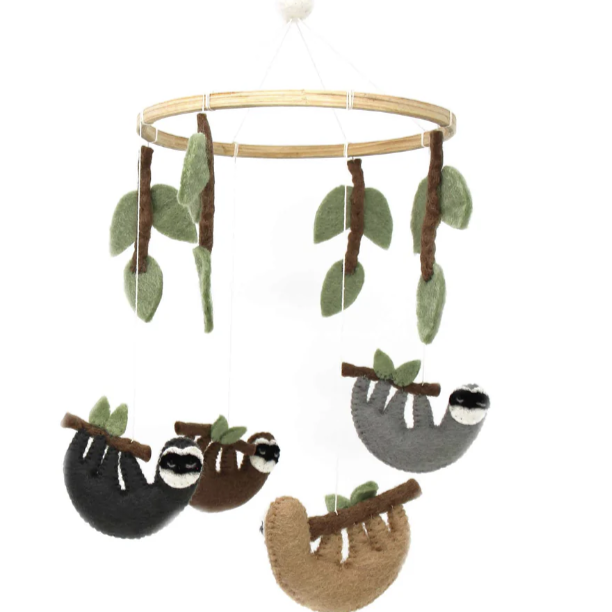 felt sloths sleeping on the vines